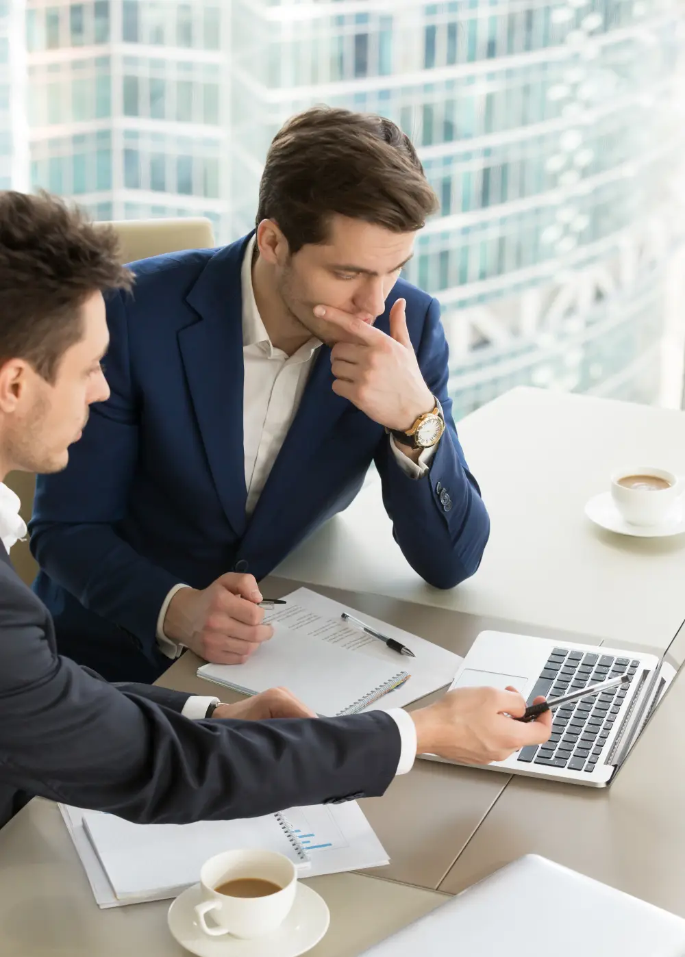 business-man-calculating-finance-numbers (1)
